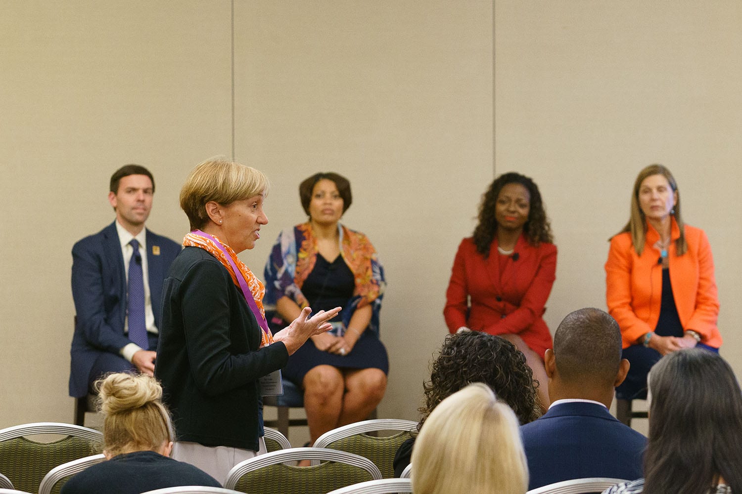 Conference_attendee_speaking_DEI_panel