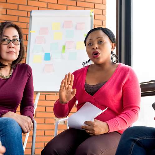 three_women_discussion